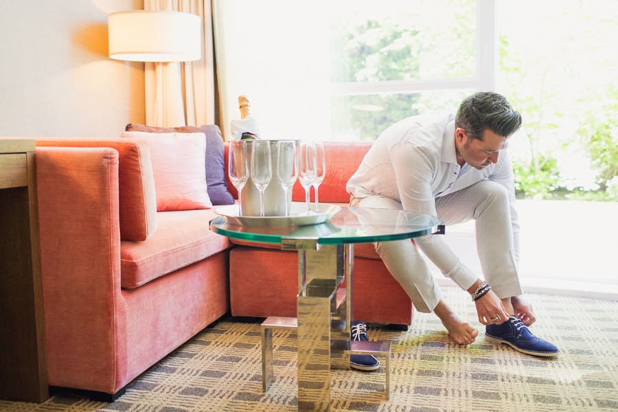 Groom getting ready at Loden Hotel in Vancouver