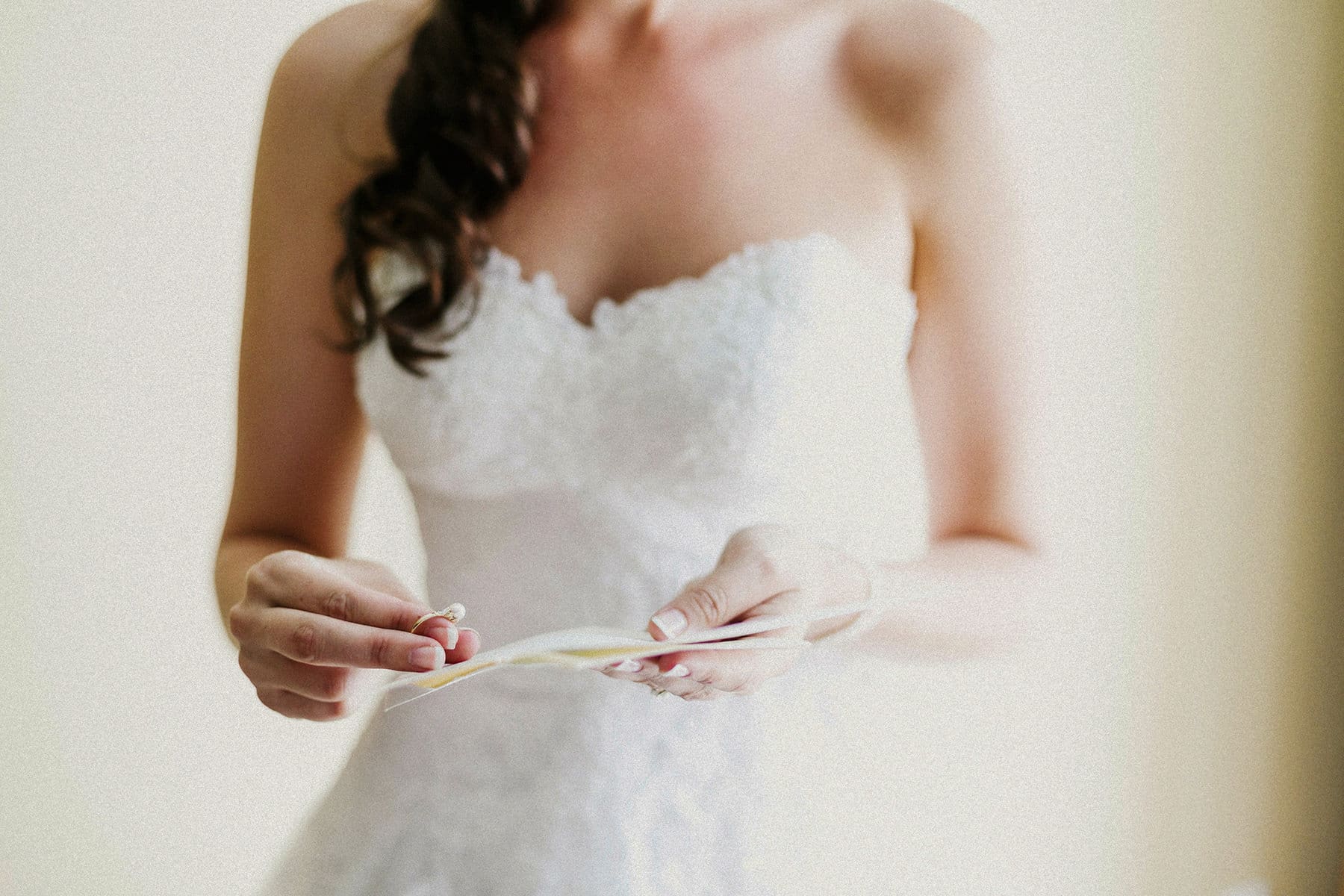 Bride receives gift from the Groom