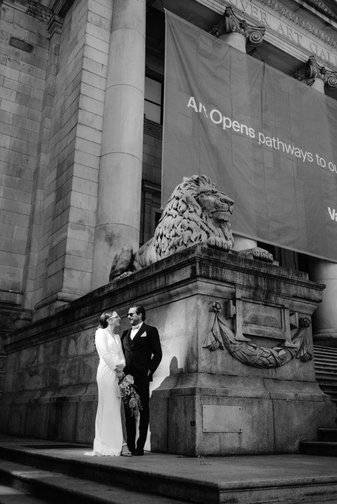 Timeless black and white portrait of the couple gazing into each other’s eyes.