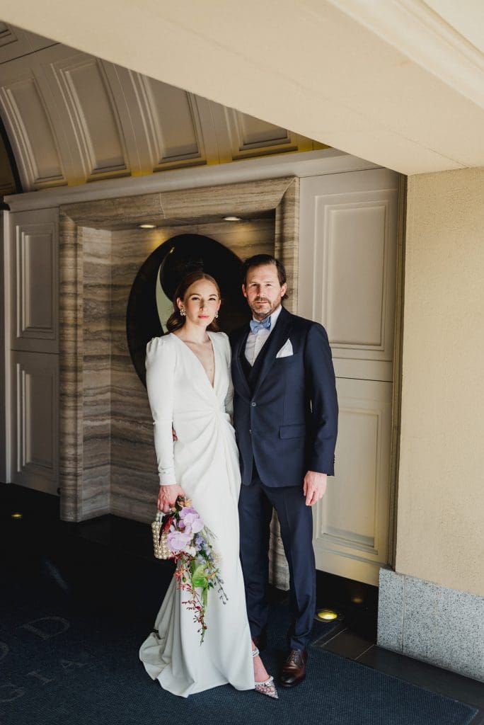 Bride and groom standing together on their wedding day.
